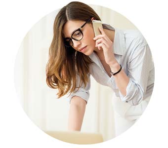 woman on the phone with laptop