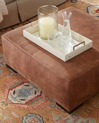 LEATHER OTTOMANS & BENCHES